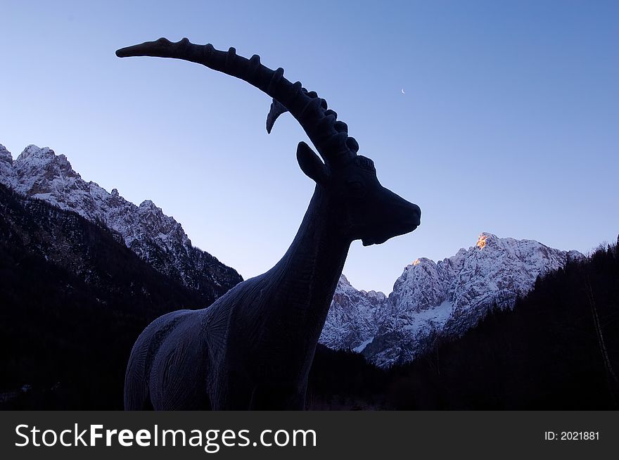 Bronze ibex statue at sunrise 1