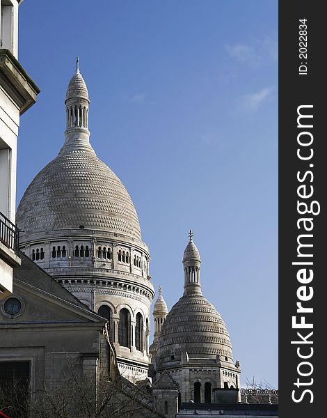 Two of the domes of Sacre Coeur cathedral from Montmartre Square, Paris. Two of the domes of Sacre Coeur cathedral from Montmartre Square, Paris