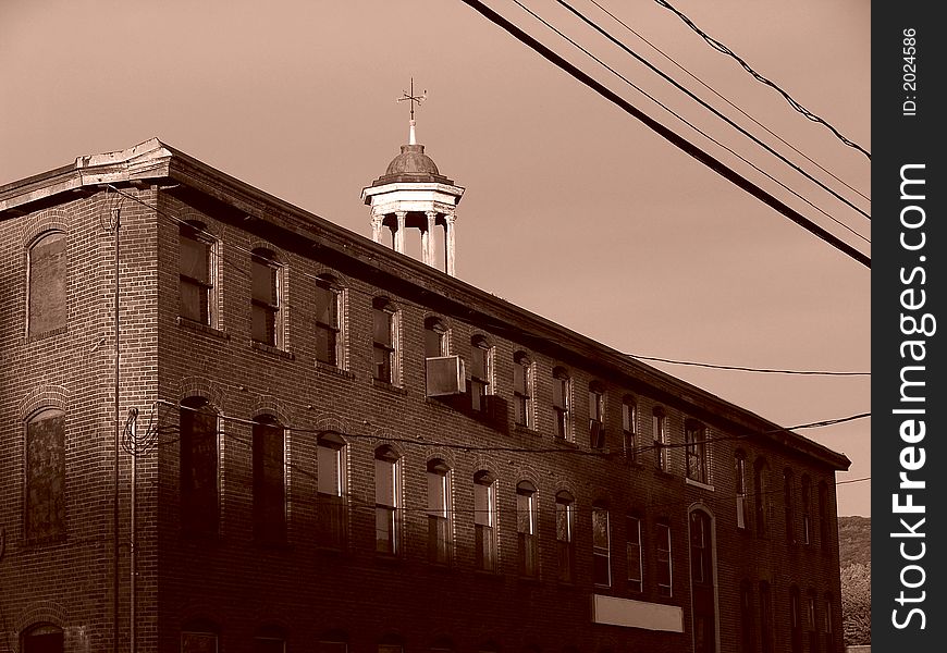 Sepia toned image of old abandoned factory in easthampton massachusetts