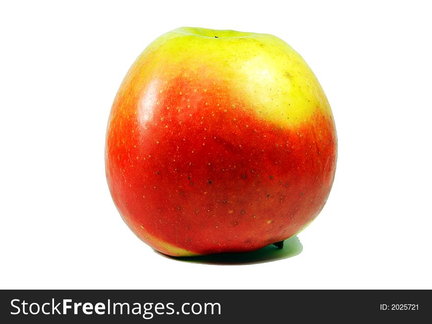 Fresh green apple with water droplets against a white background