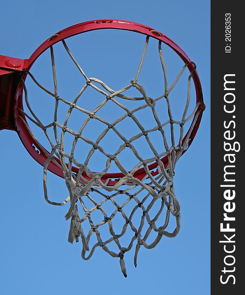 Close up of basketball net on blue background. Close up of basketball net on blue background