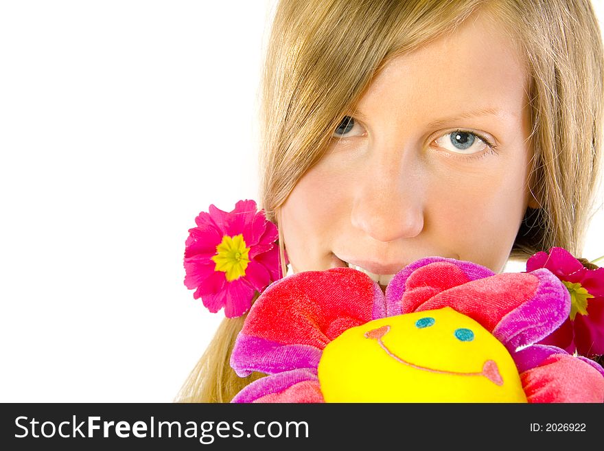 Beautiful girl with flowers. Isolated on white.