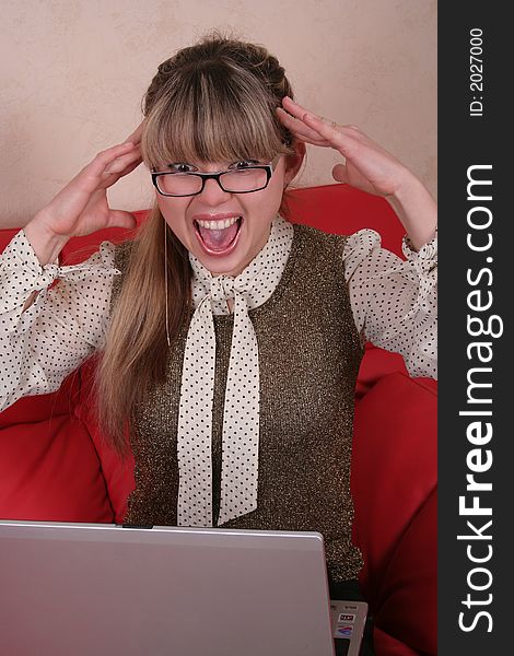 Amazed Woman In Glasses With Laptop