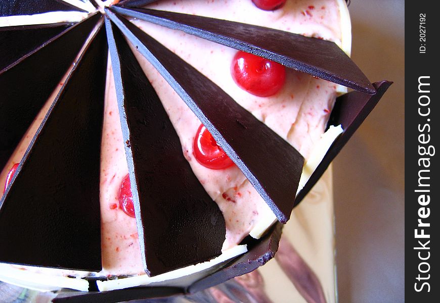 Delicious chocolate cake with maraschino cherries