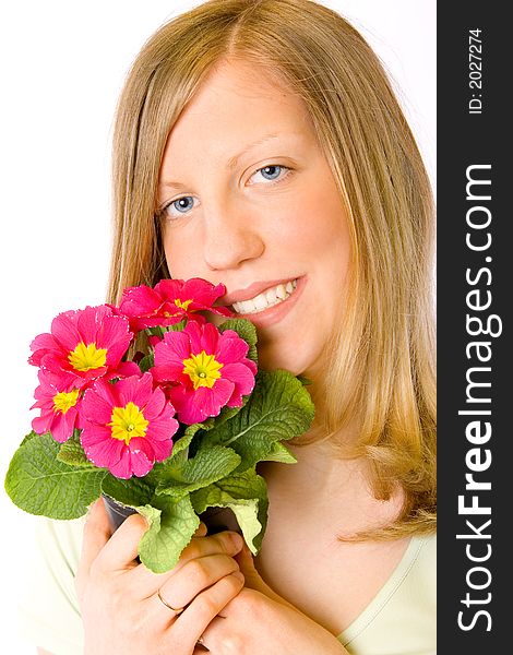 Portrait of a beautiful girl with flowers.