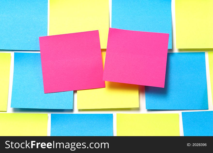 Pink, blue and yellow post-it notes...blank and ready for copy. Pink, blue and yellow post-it notes...blank and ready for copy.