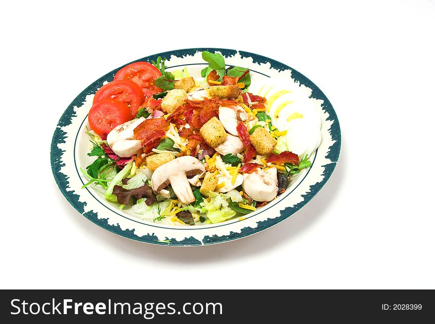 A salad with tomato and mushroom. A salad with tomato and mushroom.