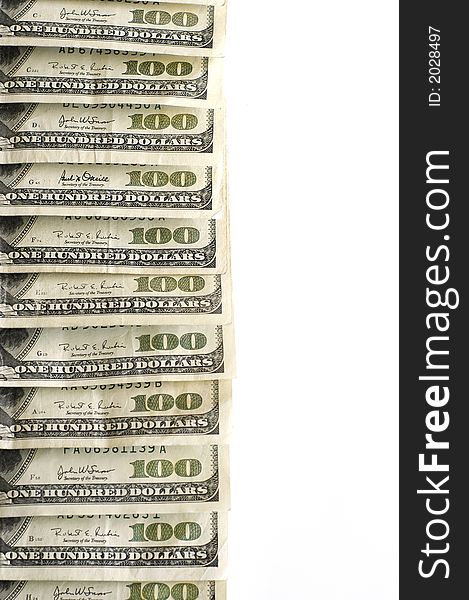 Closeup of hundred dollar bills isolated on white background. Closeup of hundred dollar bills isolated on white background