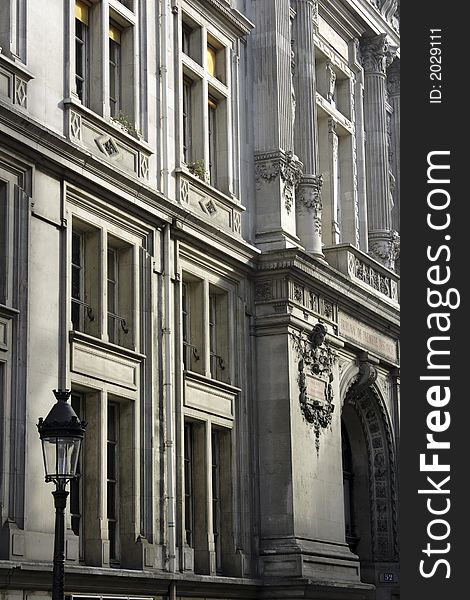 Elegant French office buildings with street lamp. Elegant French office buildings with street lamp