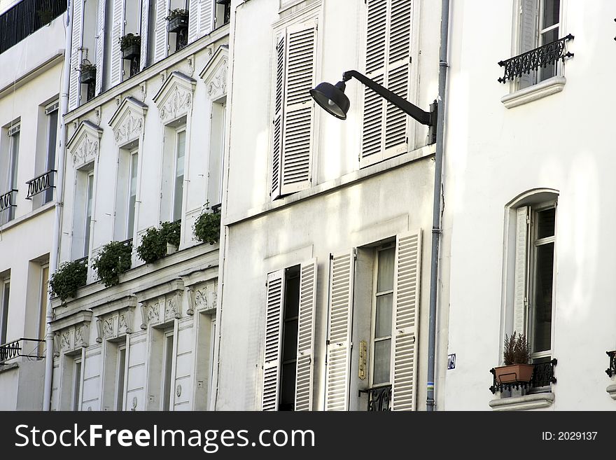 Homes in Paris France and a single street lamp. Homes in Paris France and a single street lamp
