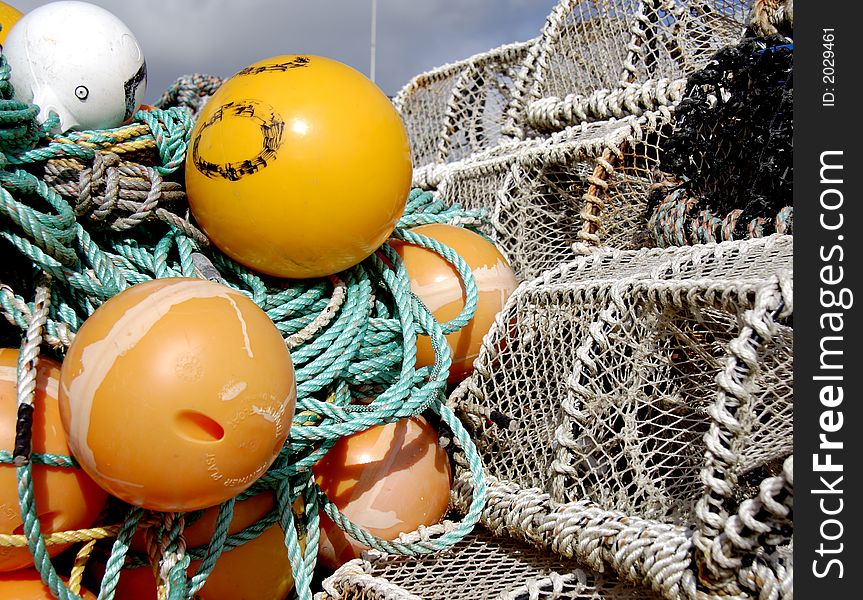 Lobster Pots and Buoys on an English Seaside Beach