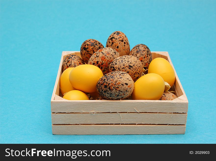 Yellow easter eggs in a basket