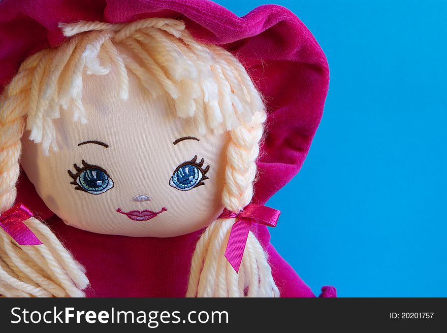 A portrait of a childs colorful rag doll. A portrait of a childs colorful rag doll