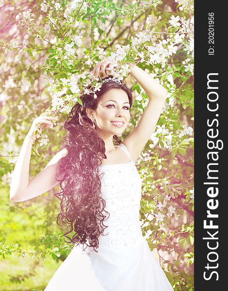 Beautiful Bride In A Blossoming Garden