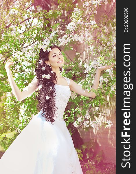 Beautiful Bride In A Blossoming Garden