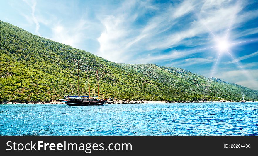 Bay In Aegean Sea And Wooden Yacht.