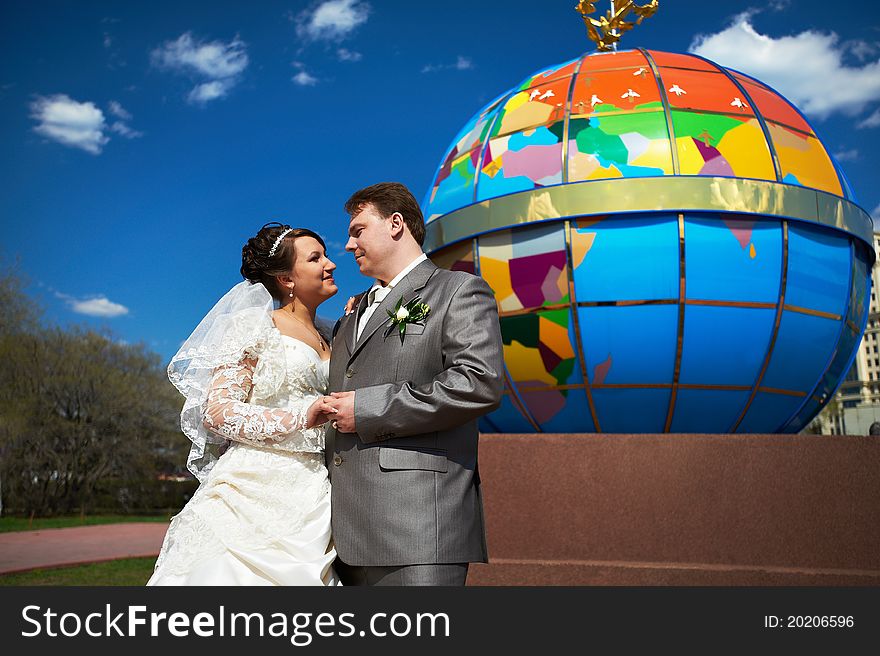 Happy couple bride and groom at a wedding walk in Museon of Moscow