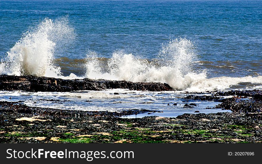 Waves crashing on the rocks. Waves crashing on the rocks