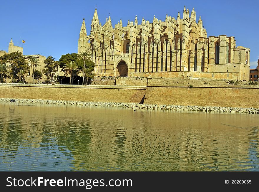 Palma, Mallorca historic cathedral along river with magnificent architecture. Palma, Mallorca historic cathedral along river with magnificent architecture