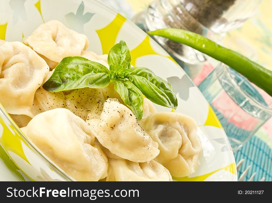 Delicious freshly cooked ravioli on a plate. Delicious freshly cooked ravioli on a plate