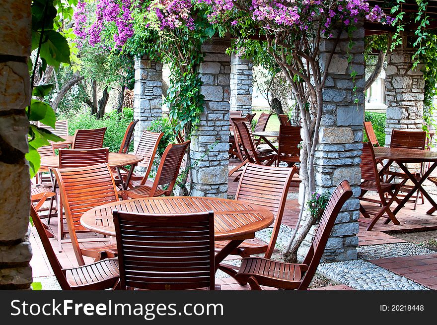 Hotel patio with table and chairs. Hotel patio with table and chairs.