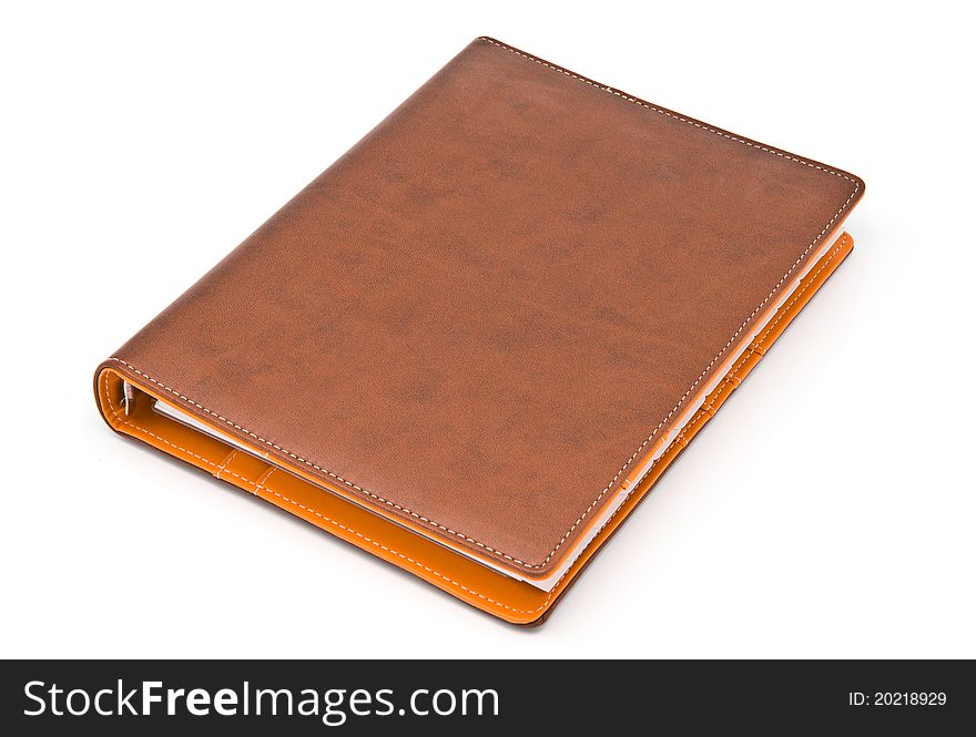 Brown notebook isolated on white background