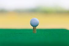 Golf Ball On The Green  With Green Background Stock Images