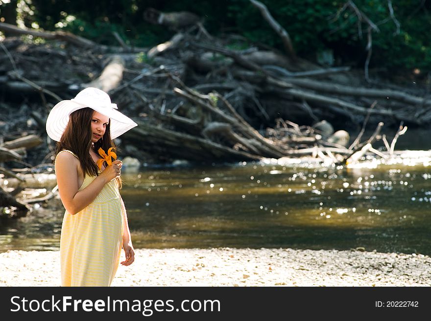 Picture of a young girl near a stream. Picture of a young girl near a stream