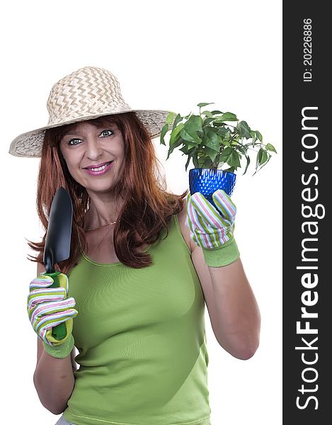 Redhead woman working in the garden isolated