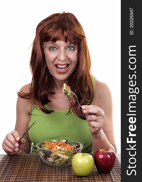 Redhead woman eating