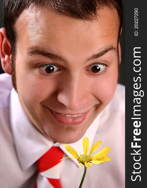 Funny guy with yellow flower. Funny guy with yellow flower