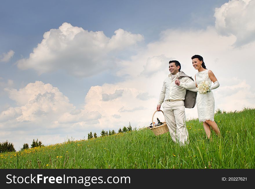 Bride And Groom In Field