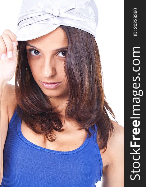 Beautiful woman wearing a silver hat and looking serious. Beautiful woman wearing a silver hat and looking serious