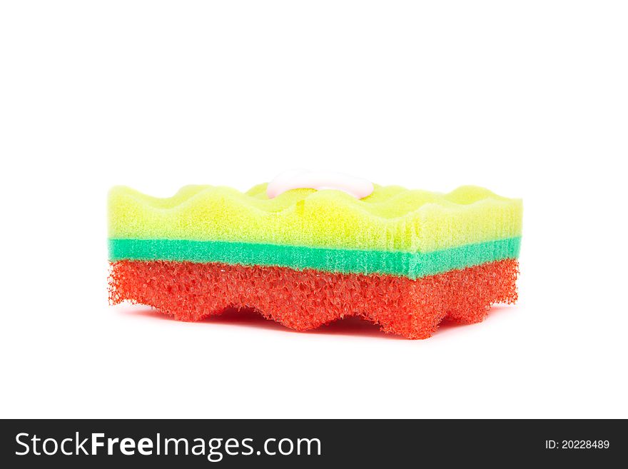 Beautiful tricolor sponge to wash the body on a white background. Beautiful tricolor sponge to wash the body on a white background