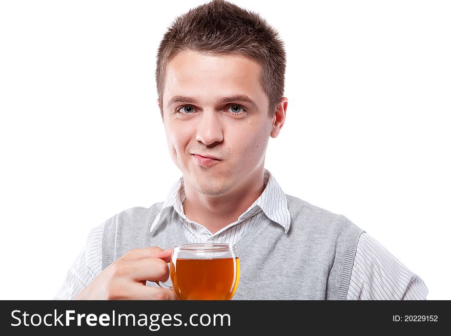 Young man with fresh cup of black tea. Young man with fresh cup of black tea