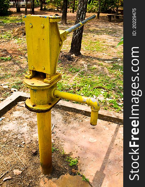 The old water pump to the rural areas of Thailand. The villagers use the water. The old water pump to the rural areas of Thailand. The villagers use the water.