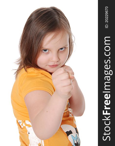 Little girl with fists isolated on white background. Little girl with fists isolated on white background