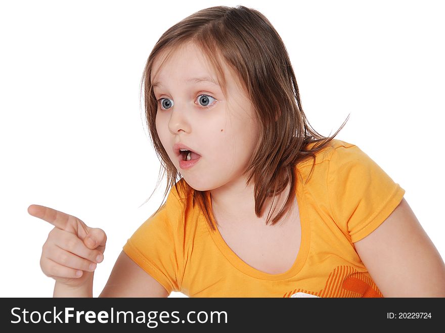 The little girl, points a finger isolated on white background