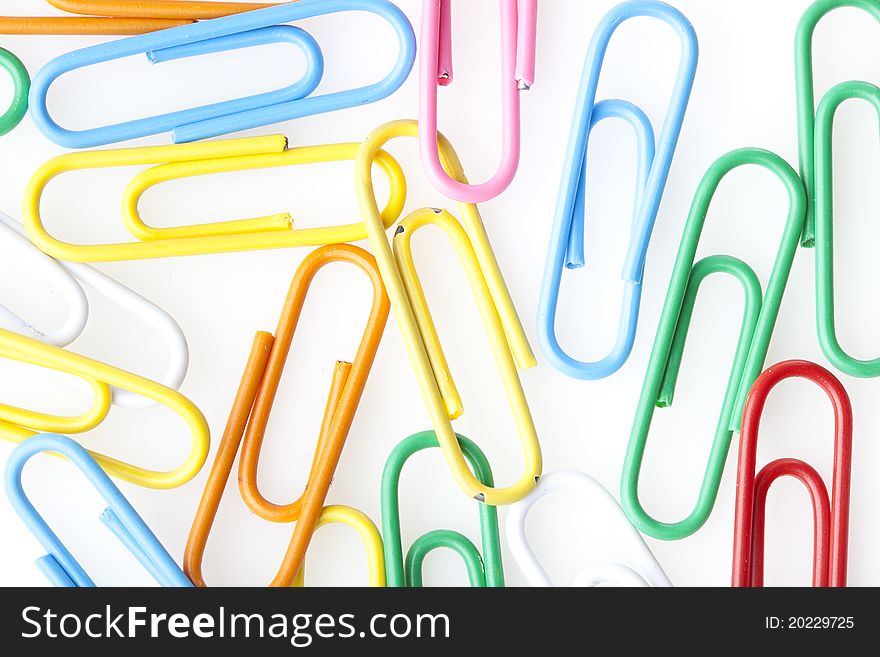 A colorful paper clip against a white background