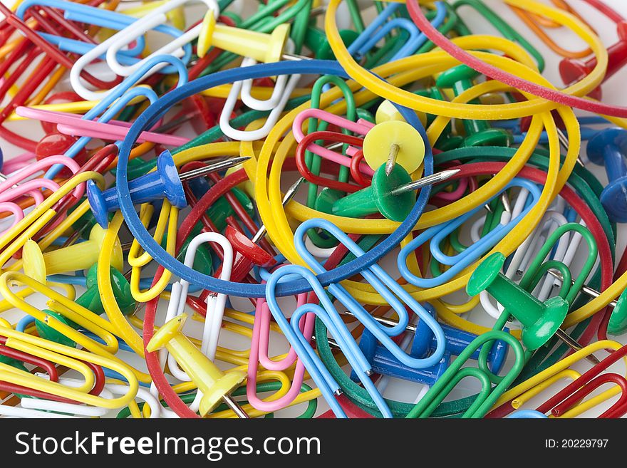 A group of colorful office supplies against a white background