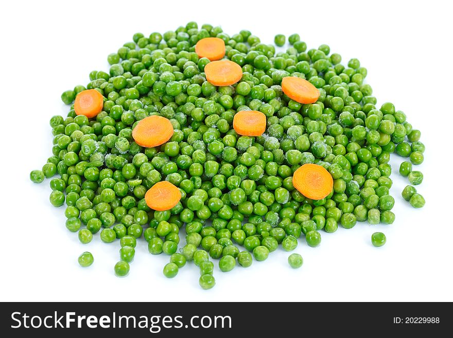 Frozen green peas with carrots on the table. Frozen green peas with carrots on the table