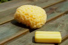 Yellow Sponge And Soap On Wood Panels Stock Photography Yellow Sponge And Soap On Wood Panels Stock Photography