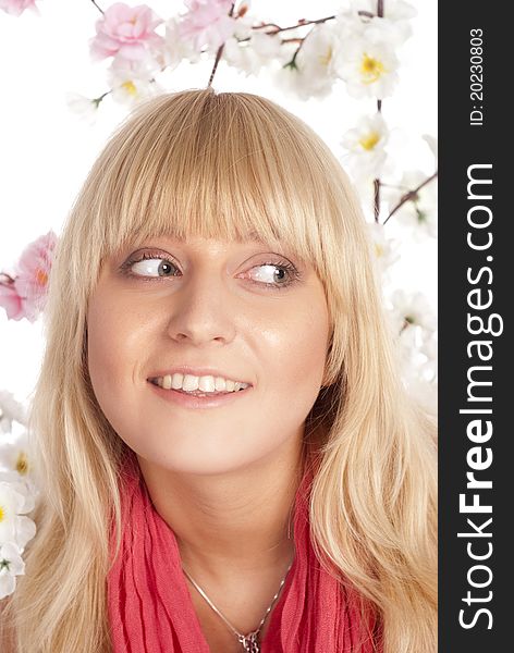 Portrait of a girl among flowers