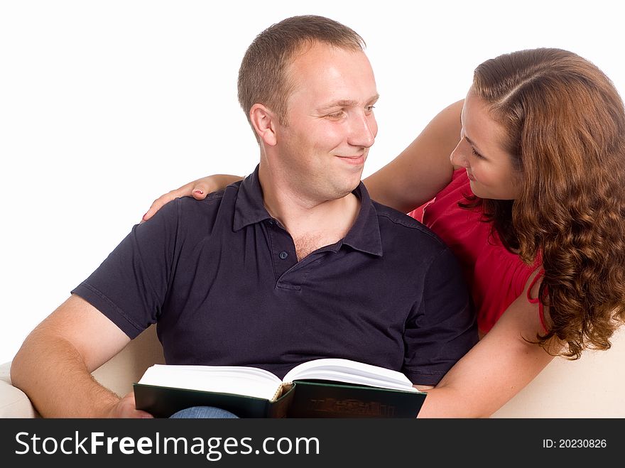 Portrait of a cute couple on a white. Portrait of a cute couple on a white