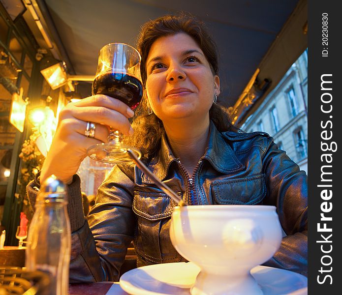 Woman Sitting In Restaurant