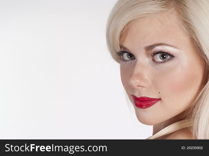 Portrait of a blonde with red lips. Portrait of a blonde with red lips