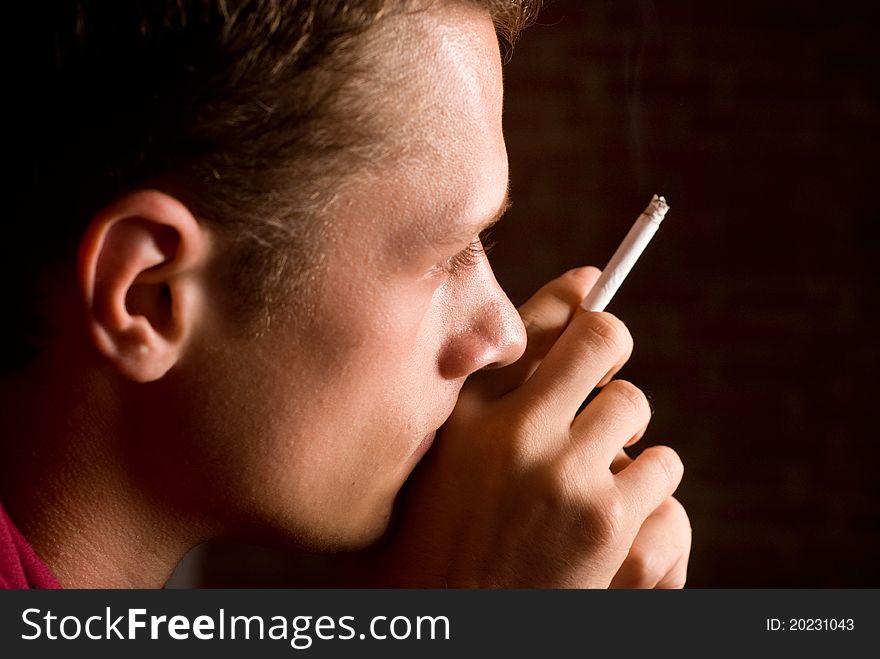 Young guy with cigarette