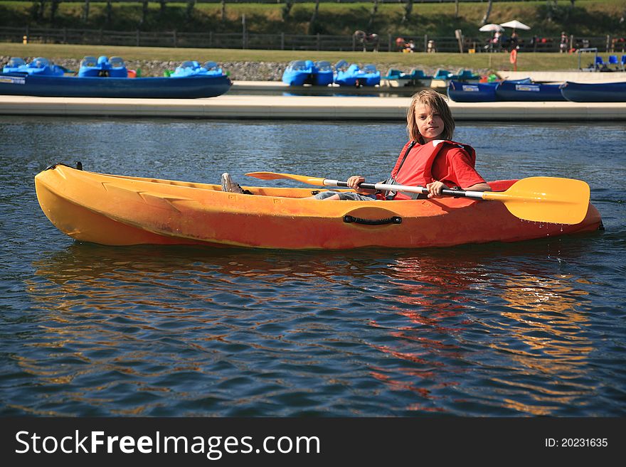 Ten years old boy in a kayak. Ten years old boy in a kayak