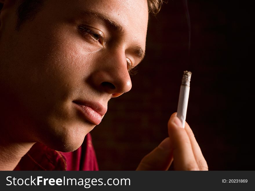 Young guy with cigarette