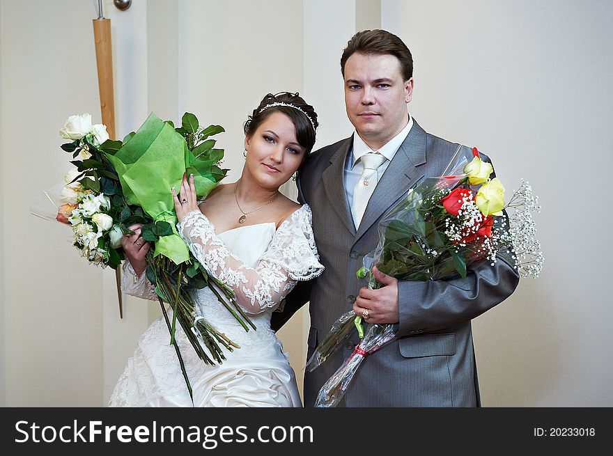 Bride and groom with flowers